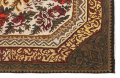Girit Red Floral Wool Handmade Area Rug 7'0" x 10'2"