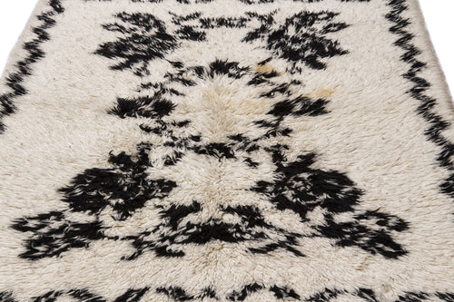 Girit Beige Floral Wool Handmade Area Rug 5'1" x 6'11"