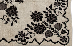Girit Beige Floral Wool Handmade Area Rug 4'11" x 7'3"