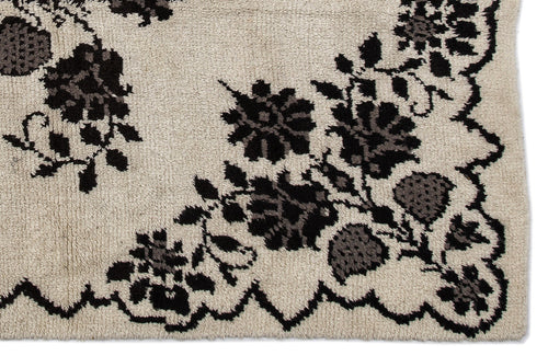 Girit Beige Floral Wool Handmade Area Rug 4'11" x 7'3"