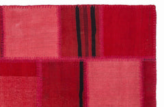 Teselya Red Patchwork Wool Handmade Area Rug 5'3" x 7'7"