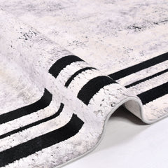Mckenna Black Frame Viscose Machine Made Area Rug