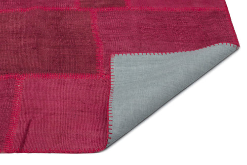 Teselya Pink Patchwork Wool Handmade Area Rug 6'6" x 9'10"