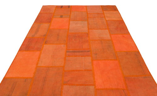 Teselya Orange Patchwork Wool Handmade Area Rug 6'5" x 9'9"