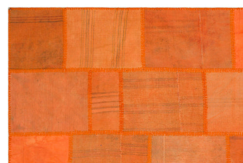 Teselya Orange Patchwork Wool Handmade Area Rug 6'5" x 9'9"