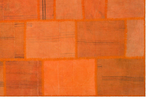 Teselya Orange Patchwork Wool Handmade Area Rug 6'5" x 9'9"