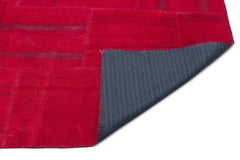 Teselya Red Patchwork Wool Handmade Area Rug 6'5" x 9'10"