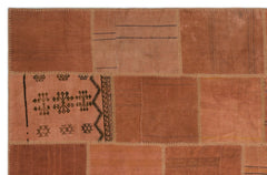 Teselya Orange Patchwork Wool Handmade Area Rug 6'6" x 9'11"