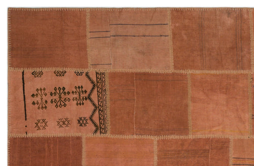 Teselya Orange Patchwork Wool Handmade Area Rug 6'6" x 9'11"