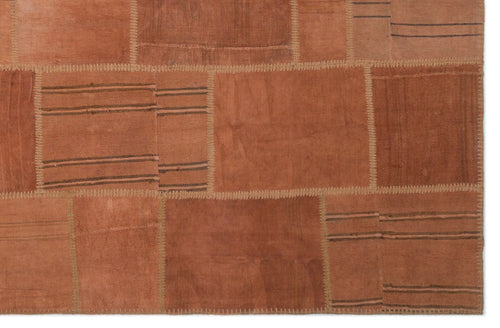 Teselya Orange Patchwork Wool Handmade Area Rug 6'6" x 9'11"