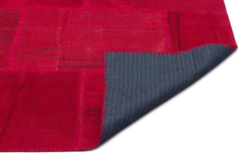 Teselya Red Patchwork Wool Handmade Area Rug 6'6" x 9'11"