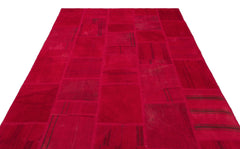 Teselya Red Patchwork Wool Handmade Area Rug 6'6" x 9'11"