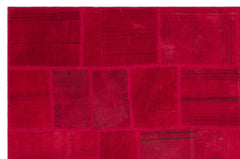 Teselya Red Patchwork Wool Handmade Area Rug 6'6" x 9'11"