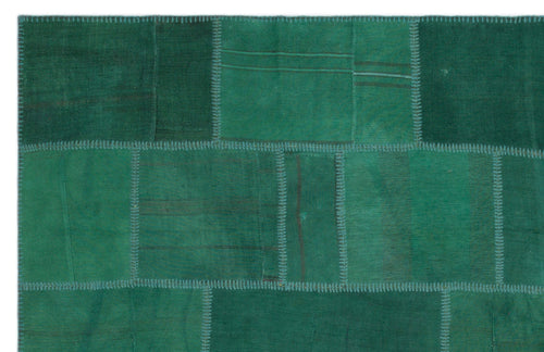 Teselya Green Patchwork Wool Handmade Area Rug 6'5" x 9'11"