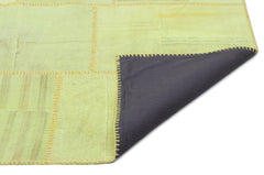 Teselya Green Patchwork Wool Handmade Area Rug 6'7" x 9'11"