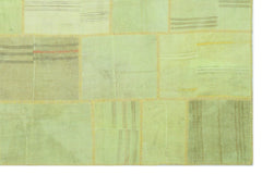 Teselya Green Patchwork Wool Handmade Area Rug 6'7" x 9'11"