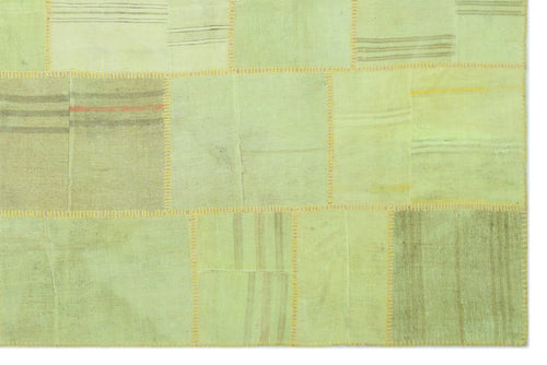 Teselya Green Patchwork Wool Handmade Area Rug 6'7" x 9'11"
