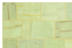 Teselya Green Patchwork Wool Handmade Area Rug 6'6" x 9'11"