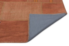 Teselya Orange Patchwork Wool Handmade Area Rug 6'4" x 9'11"