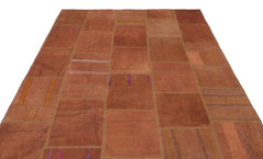 Teselya Orange Patchwork Wool Handmade Area Rug 6'4" x 9'11"