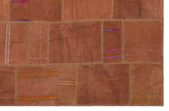 Teselya Orange Patchwork Wool Handmade Area Rug 6'4" x 9'11"