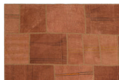 Teselya Orange Patchwork Wool Handmade Area Rug 6'5" x 9'9"