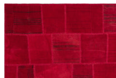 Teselya Red Patchwork Wool Handmade Area Rug 6'6" x 9'10"