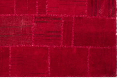 Teselya Red Patchwork Wool Handmade Area Rug 6'6" x 9'10"
