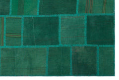 Teselya Green Patchwork Wool Handmade Area Rug 6'5" x 9'8"