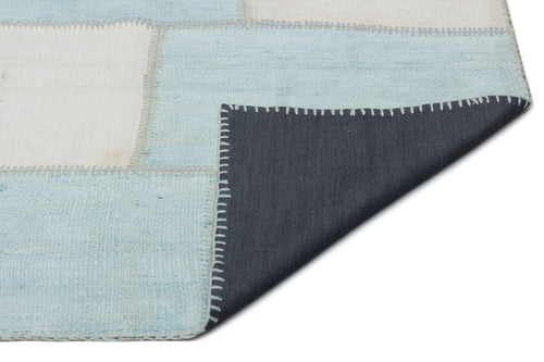 Teselya Blue Patchwork Wool Handmade Area Rug 6'4" x 9'11"
