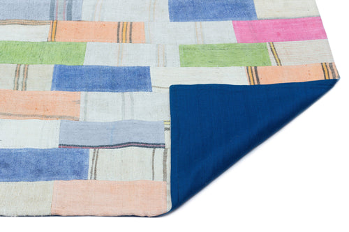 Teselya Cream Patchwork Wool Handmade Area Rug 2'9" x 5'1"