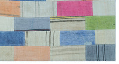 Teselya Cream Patchwork Wool Handmade Area Rug 2'9" x 5'1"