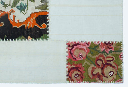 Teselya White Floral Wool Handmade Area Rug 4'0" x 5'11"