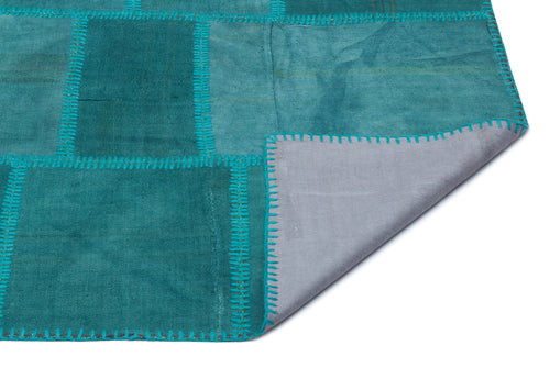 Teselya Turquoise Patchwork Wool Handmade Area Rug 3'9" x 5'11"