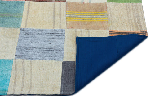 Teselya Beige Patchwork Wool Handmade Area Rug 5'5" x 7'8"