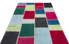 Teselya Red Patchwork Wool Handmade Area Rug 5'1" x 7'5"