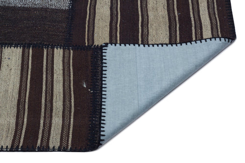 Teselya Brown Patchwork Wool Handmade Area Rug 5'4" x 7'7"