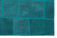 Teselya Turquoise Patchwork Wool Handmade Area Rug 4'11" x 7'5"