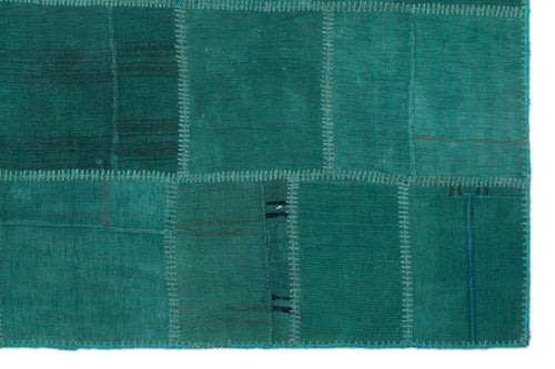 Teselya Green Patchwork Wool Handmade Area Rug 5'0" x 7'7"