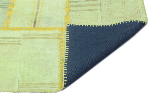 Teselya Green Patchwork Wool Handmade Area Rug 5'1" x 7'7"