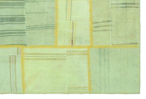 Teselya Green Patchwork Wool Handmade Area Rug 5'1" x 7'7"