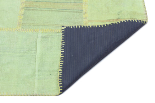 Teselya Green Patchwork Wool Handmade Area Rug 5'2" x 7'8"