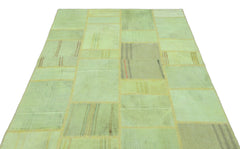Teselya Green Patchwork Wool Handmade Area Rug 5'2" x 7'8"
