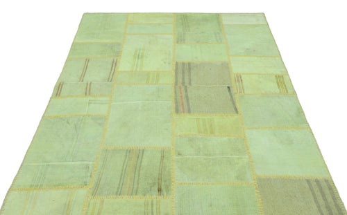 Teselya Green Patchwork Wool Handmade Area Rug 5'2" x 7'8"