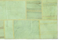 Teselya Green Patchwork Wool Handmade Area Rug 5'2" x 7'8"