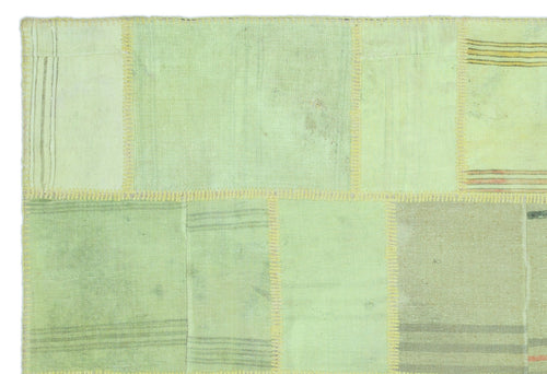 Teselya Green Patchwork Wool Handmade Area Rug 5'2" x 7'8"