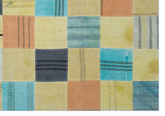 Teselya Beige Patchwork Wool Handmade Area Rug 5'4" x 7'8"