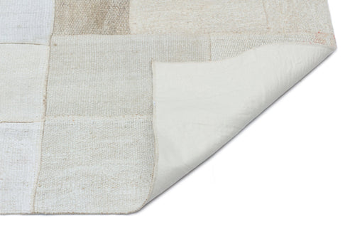 Teselya Beige Patchwork Wool Handmade Area Rug 4'11" x 6'8"