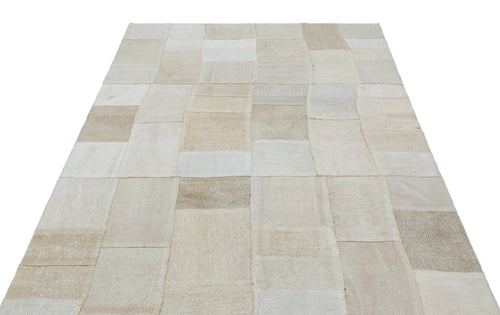 Teselya Beige Patchwork Wool Handmade Area Rug 4'11" x 6'8"