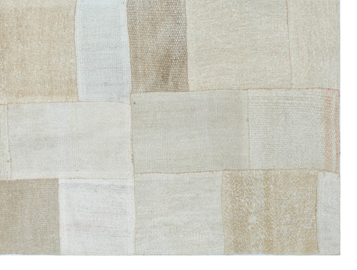 Teselya Beige Patchwork Wool Handmade Area Rug 4'11" x 6'8"